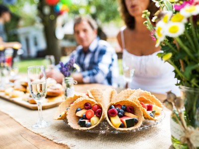 Family celebration outside in the backyard. Big garden party.